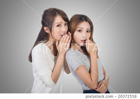 Asian friends whisper Asian friends whisper 20372558