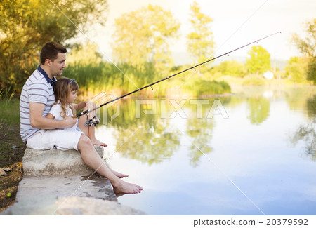 Happy father and daughter fishing Happy father and daughter fishing 20379592