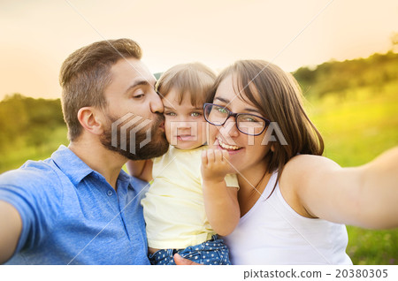 Family taking selfie 20380305