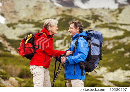 Senior couple hiking 20380307
