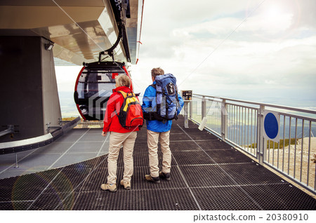 Senior hikers waiting for cableway 20380910