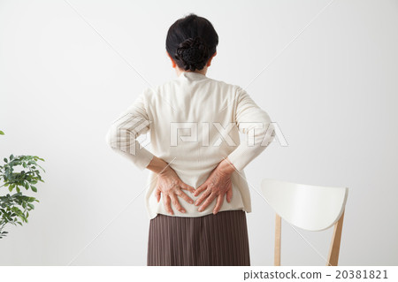 Senior female low back pain suppressing back Senior female low back pain suppressing back 20381821