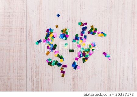 Colorful confetti on wood background 20387178