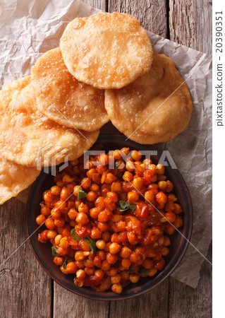 Delicious Indian Chana masala and puri close-up 20390351