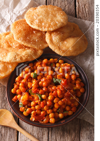 Indian Chana masala and puri bread close-up 20390354