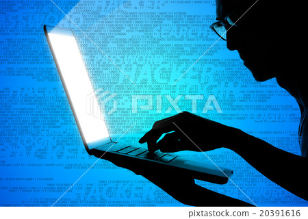 Hacker typing on laptop Hacker typing on laptop 20391616