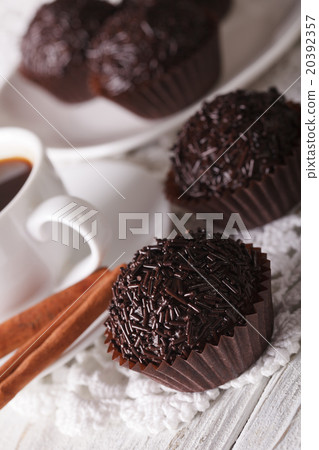Brazilian Brigadeiro sweet and coffee close-up 20392357