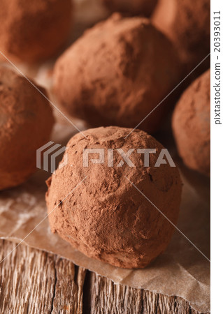 Homemade Chocolate truffles macro on a table Homemade Chocolate truffles macro on a table 20393011