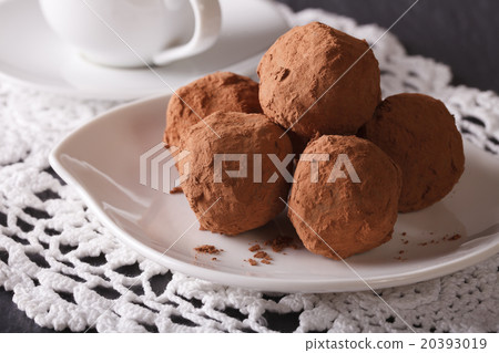 Chocolate truffles on a saucer closeup. horizontal Chocolate truffles on a saucer closeup. horizontal 20393019
