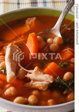 Chickpea soup with chicken close up in a bowl Chickpea soup with chicken close up in a bowl 20393052