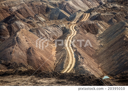 Large excavation site with roads ahead Large excavation site with roads ahead 20395010