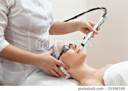 Woman in healthy spa salon 20396598