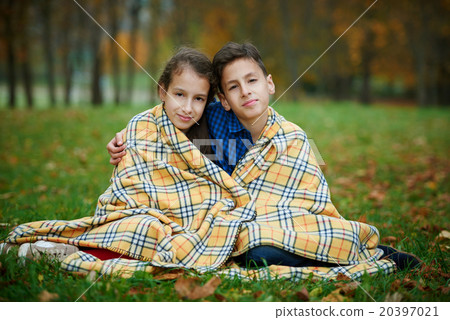 boy and girl in autumn park boy and girl in autumn park 20397021