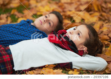 boy and girl in autumn park boy and girl in autumn park 20397106