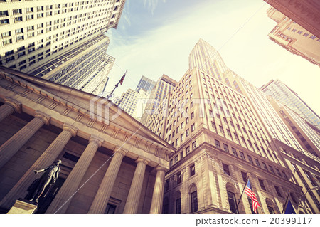 Vintage toned Wall Street at sunset, NYC. Vintage toned Wall Street at sunset, NYC. 20399117