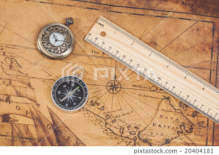 Old style brass compass on antique map Old style brass compass on antique map 20404181