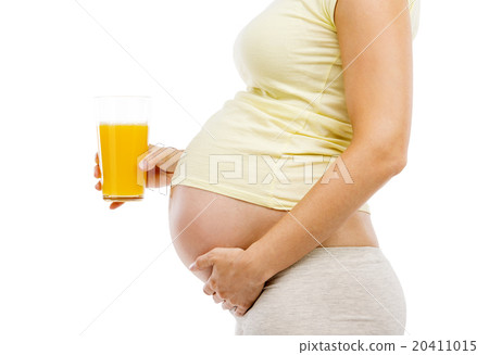 Pregnant woman with orange juice 20411015