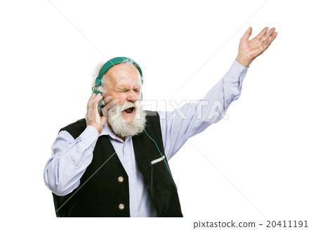 Old bearded man listening music Old bearded man listening music 20411191