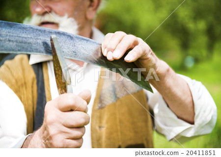 Man with scythe Man with scythe 20411851