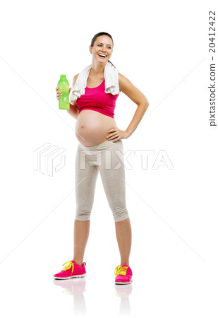 Pregnant fitness woman isolated on white 20412422