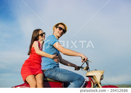 Couple on motorbike 20412686