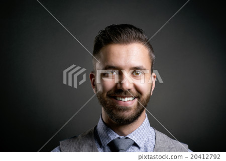 Hipster businessman in studio 20412792