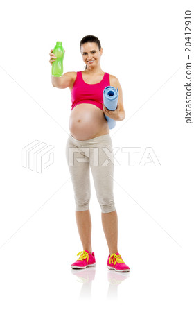 Pregnant fitness woman isolated on white 20412910