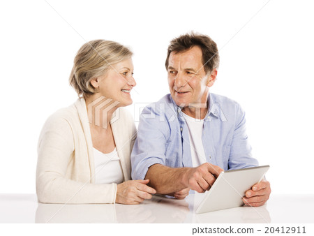 Senior couple with tablet Senior couple with tablet 20412911
