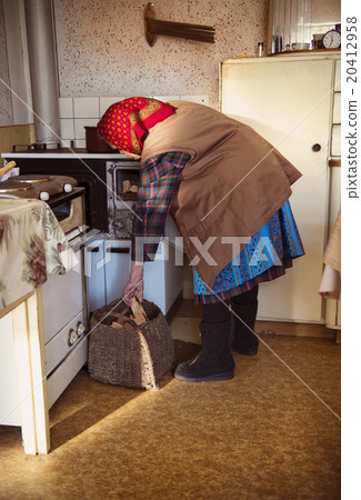 Old woman in the kitchen Old woman in the kitchen 20412958