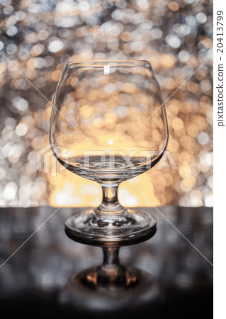 Whiskey glass empty on the background bokeh 20413799