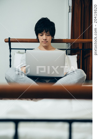 A man who tampers with a computer before going to bed 20419820