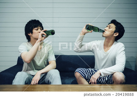 Male drinking beer 20419888
