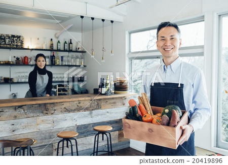 Men with vegetables 20419896