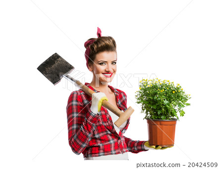 Pin-up girl holding flower pot with yellow daisies 20424509