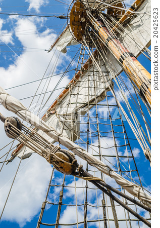 Mast with sails of an old sailing vessel Mast with sails of an old sailing vessel 20425623