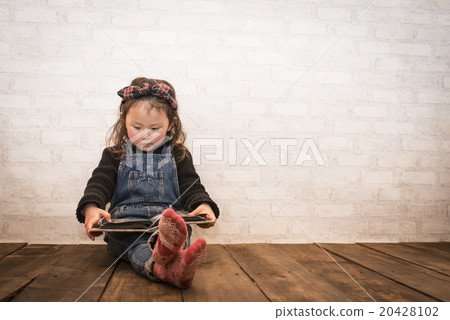 A girl reading a book A girl reading a book 20428102