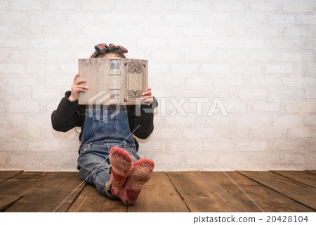 A girl reading a book 20428104