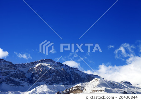 Snowy rocks at sun day 20430844