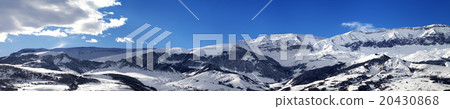 Panoramic view on snowy mountains at nice sun day 20430868