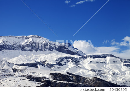 Snowy mountains at nice sun day 20430895