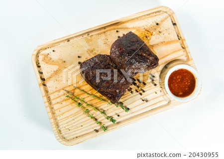 Beautiful juicy well done steak with sauce 20430955