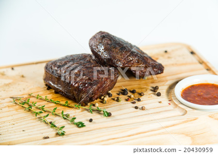 Beautiful juicy well done steak with sauce Beautiful juicy well done steak with sauce 20430959