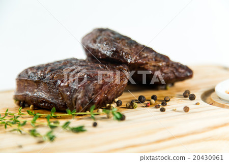 Beautiful juicy well done steak with sauce Beautiful juicy well done steak with sauce 20430961