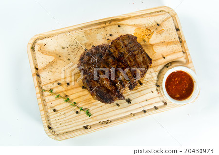 Beautiful juicy well done steak with sauce Beautiful juicy well done steak with sauce 20430973