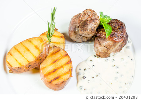 Beautiful juicy grilled meat with fried potatoes Beautiful juicy grilled meat with fried potatoes 20431298