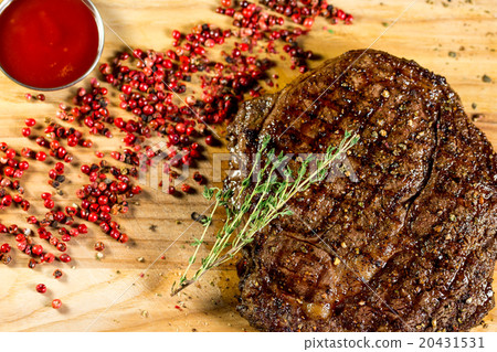 juicy, and beautiful steak with spiced on wooden juicy, and beautiful steak with spiced on wooden 20431531