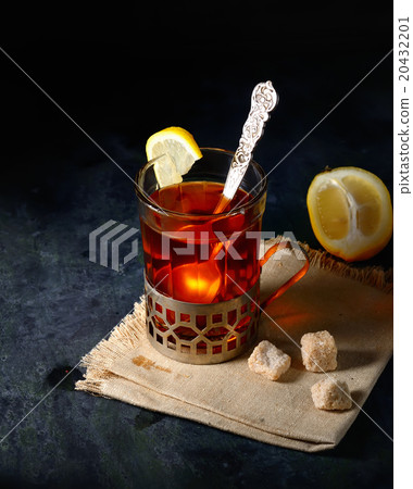 Vintage glass-holder on knitted napkin with cup of Vintage glass-holder on knitted napkin with cup of 20432201