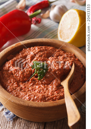 Muhammara - appetizer of peppers and nuts close-up Muhammara - appetizer of peppers and nuts close-up 20433333