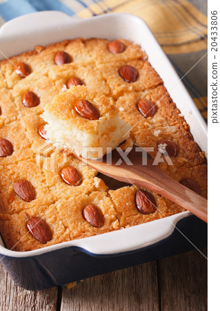 cake with almonds basbousa close up in baking dish cake with almonds basbousa close up in baking dish 20433806