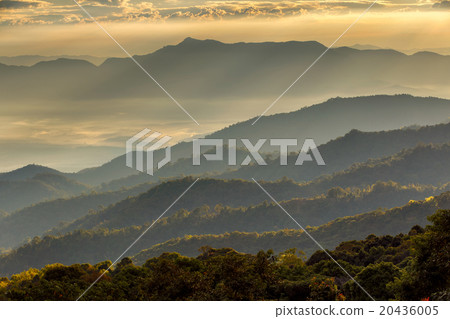 Layer of mountains and mist at sunset time 20436005